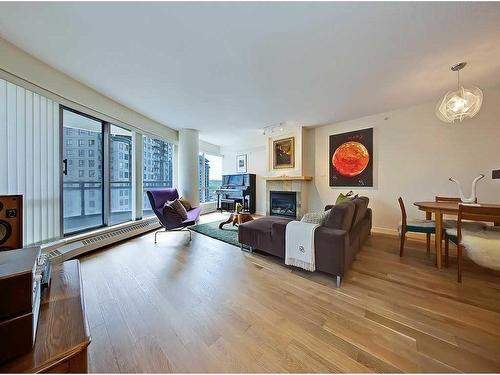 904-1088 6 Avenue Sw, Calgary, AB - Indoor Photo Showing Living Room With Fireplace