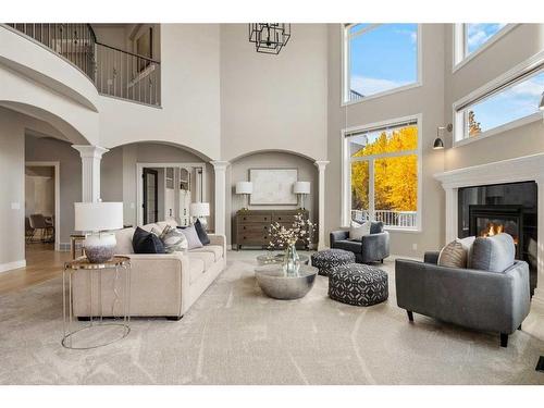 74 Patterson Close Sw, Calgary, AB - Indoor Photo Showing Living Room With Fireplace