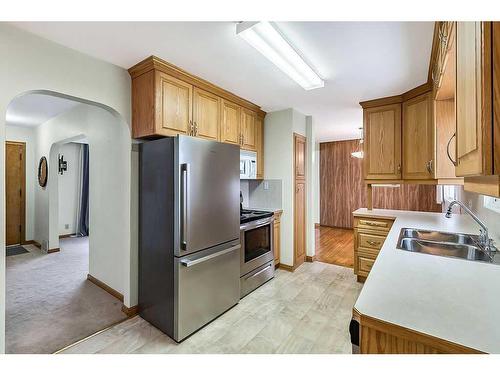 3807 25 Avenue Sw, Calgary, AB - Indoor Photo Showing Kitchen With Double Sink