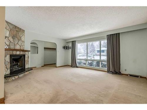 3807 25 Avenue Sw, Calgary, AB - Indoor Photo Showing Other Room With Fireplace