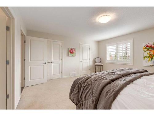 211 Valley Ridge Manor Nw, Calgary, AB - Indoor Photo Showing Bedroom