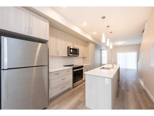 1023 Sage Hill Grove Nw, Calgary, AB - Indoor Photo Showing Kitchen With Upgraded Kitchen