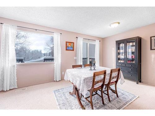 7-73 Glenbrook Crescent, Cochrane, AB - Indoor Photo Showing Kitchen With Double Sink