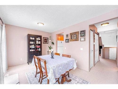 7-73 Glenbrook Crescent, Cochrane, AB - Indoor Photo Showing Dining Room