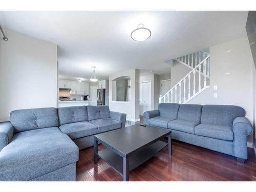 155 Willowbrook Drive Nw, Airdrie, AB - Indoor Photo Showing Living Room