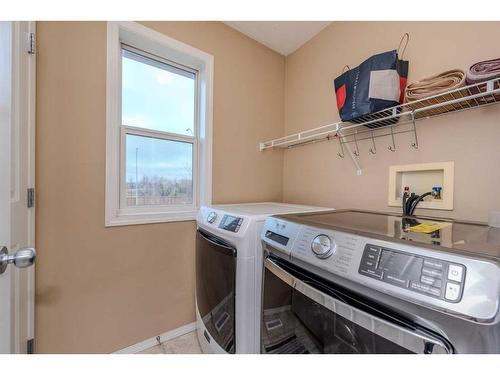 155 Willowbrook Drive Nw, Airdrie, AB - Indoor Photo Showing Laundry Room