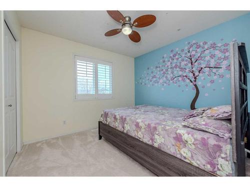 155 Willowbrook Drive Nw, Airdrie, AB - Indoor Photo Showing Bedroom