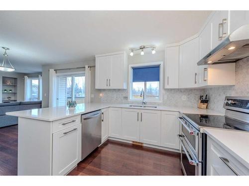 155 Willowbrook Drive Nw, Airdrie, AB - Indoor Photo Showing Kitchen With Stainless Steel Kitchen With Upgraded Kitchen