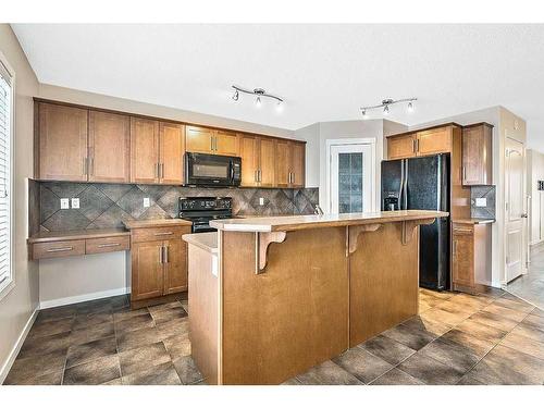 14 Silverado Saddle Heights Sw, Calgary, AB - Indoor Photo Showing Kitchen