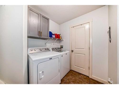 141 Cranston Way Se, Calgary, AB - Indoor Photo Showing Laundry Room