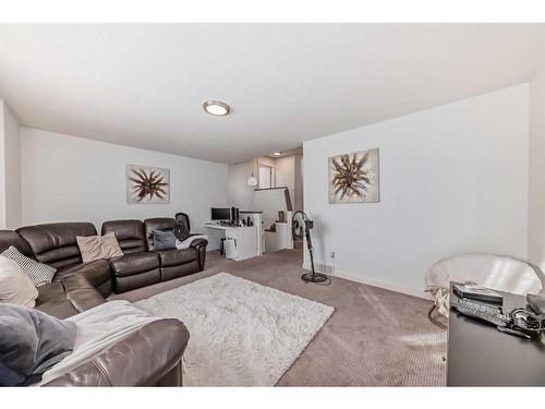 141 Cranston Way Se, Calgary, AB - Indoor Photo Showing Living Room