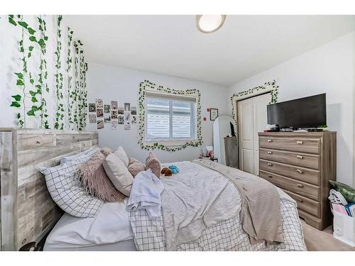 141 Cranston Way Se, Calgary, AB - Indoor Photo Showing Bedroom