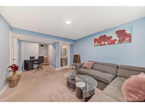 141 Cranston Way Se, Calgary, AB - Indoor Photo Showing Living Room