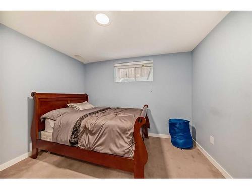 141 Cranston Way Se, Calgary, AB - Indoor Photo Showing Bedroom