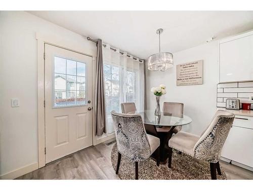 141 Cranston Way Se, Calgary, AB - Indoor Photo Showing Dining Room