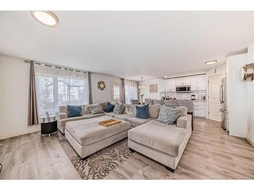 141 Cranston Way Se, Calgary, AB - Indoor Photo Showing Living Room