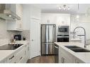 4308-522 Cranford Drive Se, Calgary, AB  - Indoor Photo Showing Kitchen With Double Sink With Upgraded Kitchen 