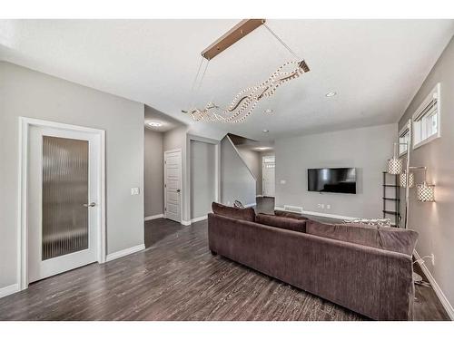 151 Masters Link Se, Calgary, AB - Indoor With Fireplace