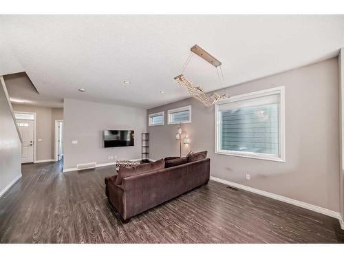 151 Masters Link Se, Calgary, AB - Indoor Photo Showing Living Room