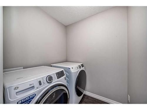 151 Masters Link Se, Calgary, AB - Indoor Photo Showing Laundry Room