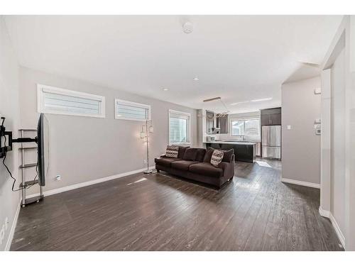 151 Masters Link Se, Calgary, AB - Indoor Photo Showing Living Room