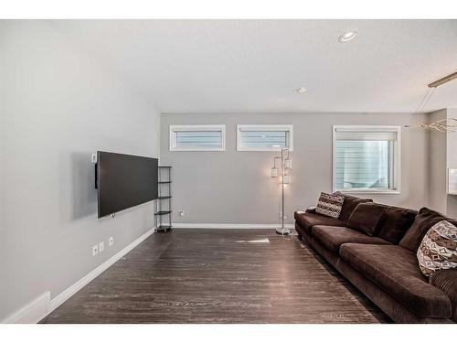 151 Masters Link Se, Calgary, AB - Indoor Photo Showing Living Room