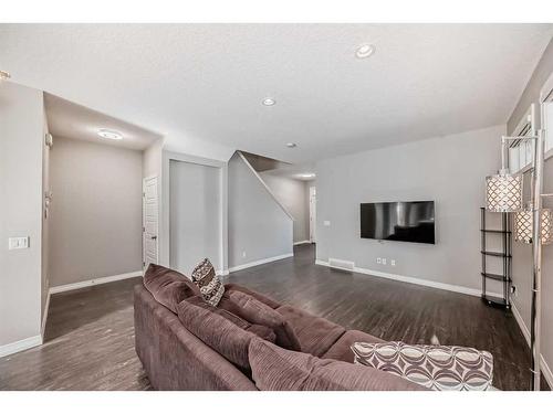 151 Masters Link Se, Calgary, AB - Indoor Photo Showing Living Room