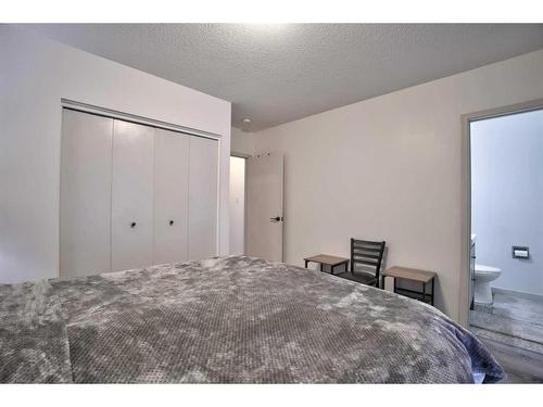 9311 Fairmount Drive Se, Calgary, AB - Indoor Photo Showing Bedroom