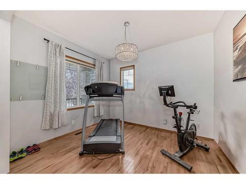 159 Crystal Shores Drive, Okotoks, AB - Indoor Photo Showing Gym Room