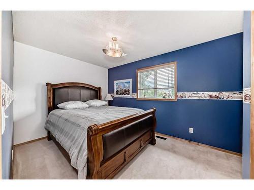 159 Crystal Shores Drive, Okotoks, AB - Indoor Photo Showing Bedroom