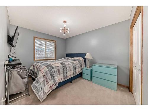 159 Crystal Shores Drive, Okotoks, AB - Indoor Photo Showing Bedroom