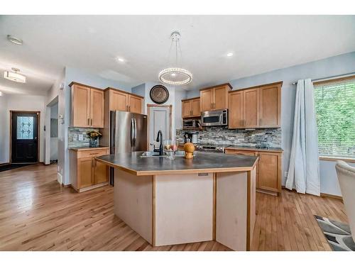 159 Crystal Shores Drive, Okotoks, AB - Indoor Photo Showing Kitchen With Stainless Steel Kitchen With Double Sink