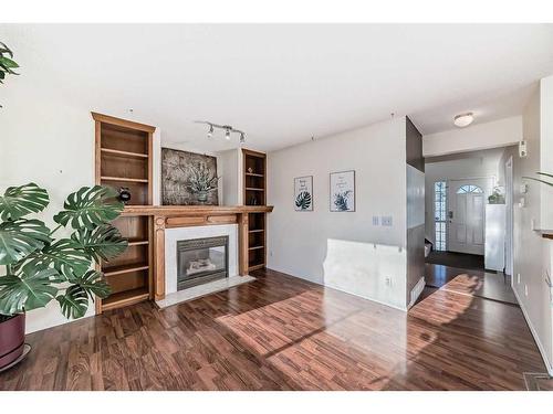 23 Harvest Rose Circle Ne, Calgary, AB - Indoor Photo Showing Other Room With Fireplace