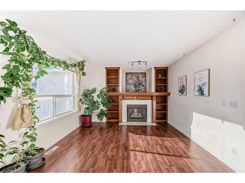 23 Harvest Rose Circle Ne, Calgary, AB - Indoor Photo Showing Living Room With Fireplace