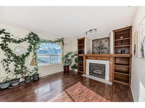 23 Harvest Rose Circle Ne, Calgary, AB - Indoor Photo Showing Living Room With Fireplace