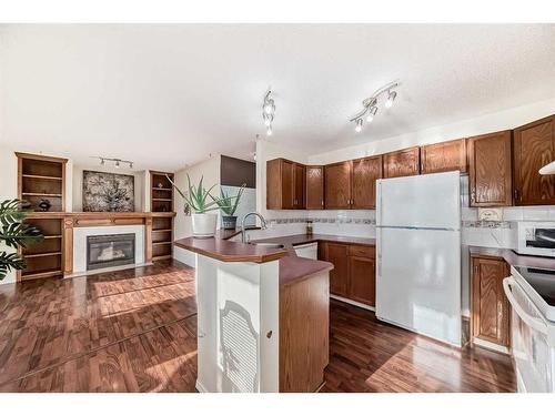 23 Harvest Rose Circle Ne, Calgary, AB - Indoor Photo Showing Kitchen With Double Sink