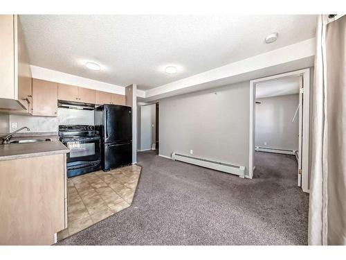 419-1717 60 Street Se, Calgary, AB - Indoor Photo Showing Kitchen