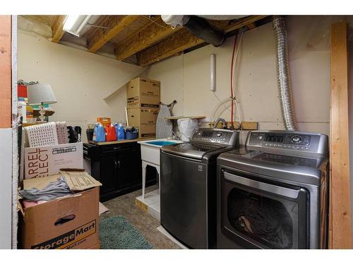 41 Evermeadow Manor Sw, Calgary, AB - Indoor Photo Showing Laundry Room