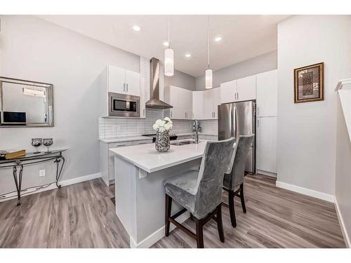 204 Crestbrook Common Sw, Calgary, AB - Indoor Photo Showing Kitchen With Stainless Steel Kitchen With Upgraded Kitchen