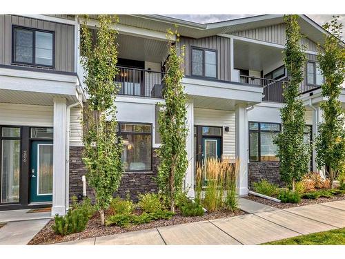 204 Crestbrook Common Sw, Calgary, AB - Outdoor With Facade