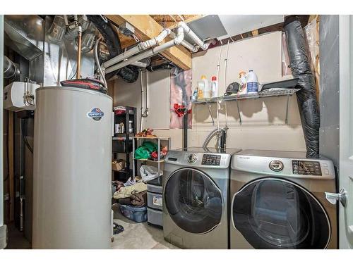 123 New Brighton Landing Se, Calgary, AB - Indoor Photo Showing Laundry Room