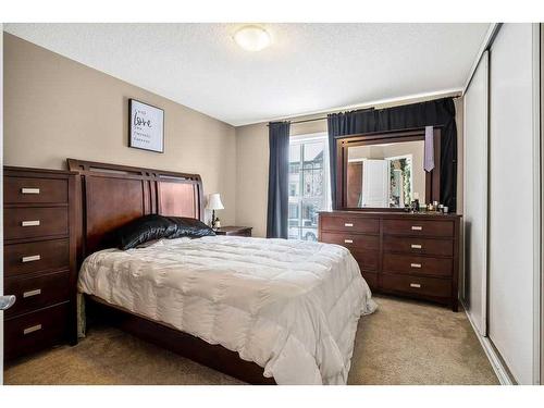 123 New Brighton Landing Se, Calgary, AB - Indoor Photo Showing Bedroom