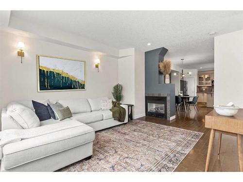 2002 35 Avenue Sw, Calgary, AB - Indoor Photo Showing Living Room With Fireplace