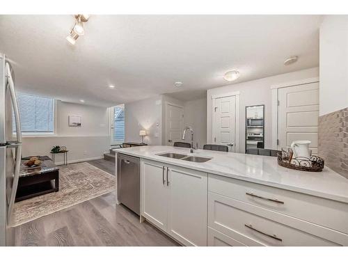 509-474 Seton Circle Se, Calgary, AB - Indoor Photo Showing Kitchen With Double Sink