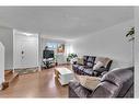 23A Ranchero Bay Nw, Calgary, AB  - Indoor Photo Showing Living Room 