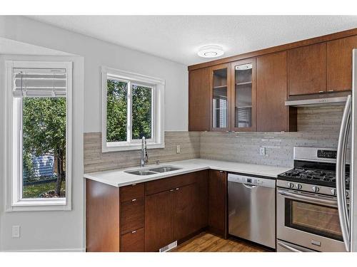 82 Taraglen Road Ne, Calgary, AB - Indoor Photo Showing Kitchen With Stainless Steel Kitchen With Double Sink