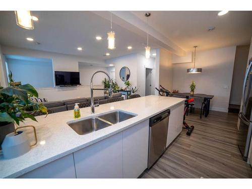 4375 Seton Drive Se, Calgary, AB - Indoor Photo Showing Kitchen With Double Sink