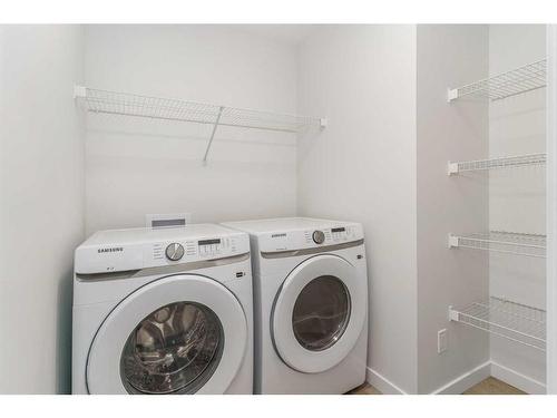 333 Magnolia Way Se, Calgary, AB - Indoor Photo Showing Laundry Room