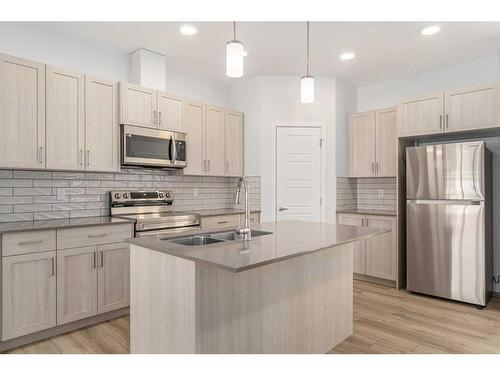 333 Magnolia Way Se, Calgary, AB - Indoor Photo Showing Kitchen With Double Sink With Upgraded Kitchen