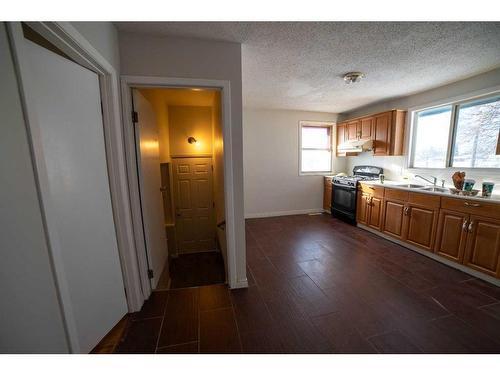 1322 34 Street Se, Calgary, AB - Indoor Photo Showing Kitchen With Double Sink